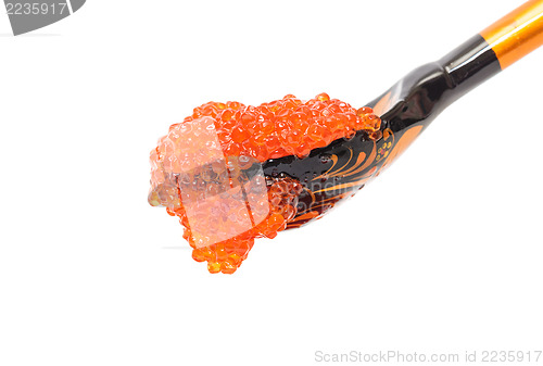 Image of Red salted caviar with wooden spoon