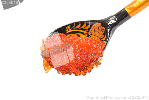 Image of Red salted caviar with wooden spoon