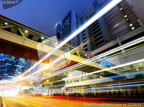 Image of city in night with busy traffic
