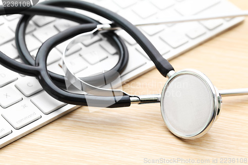 Image of stethoscope on keyboard