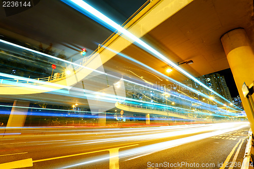 Image of Traffic under the bridge at night 