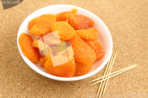 Image of Dried apricots with toothpick 