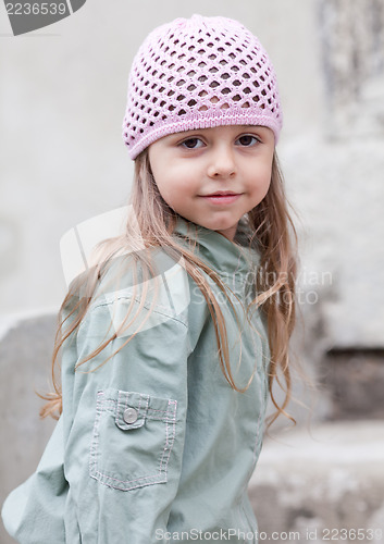 Image of Little girl in knit pink hat