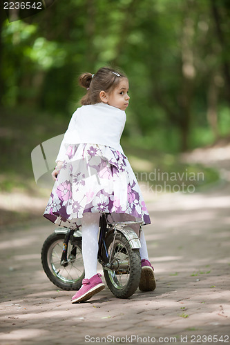 Image of Girl on a bicycle