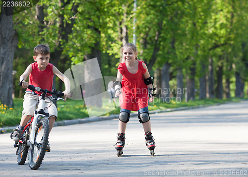 Image of Cyclist and rollerblader