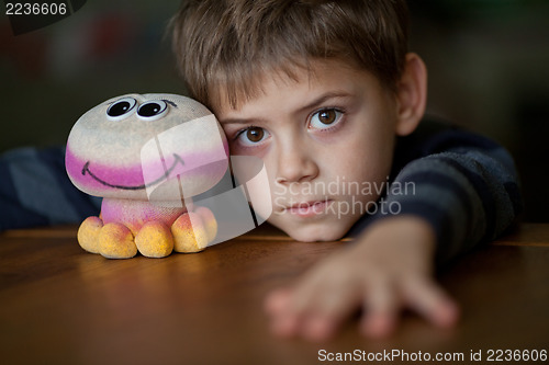 Image of Boy with Alien Toy