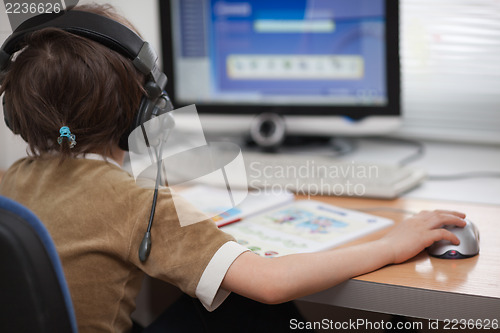 Image of Kid working with  computer