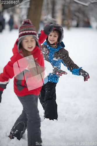 Image of Children playing with snow