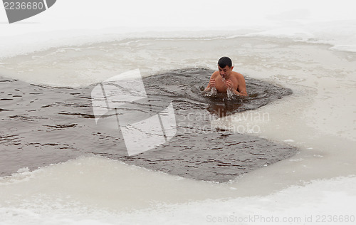 Image of Man in ice cold water