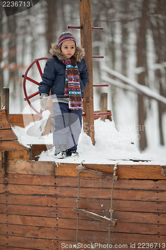 Image of Little girl in winter park
