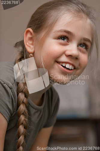 Image of Smiling girl with braided hair 