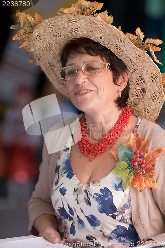 Image of Portrait of women in a Autumn-like dress