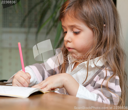 Image of Little girl drawing