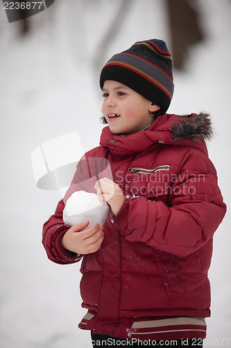 Image of Boy with  snowball