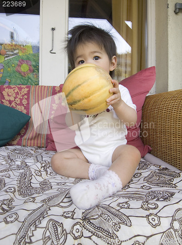 Image of Anael with melon