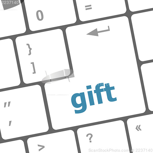 Image of gift word on computer pc keyboard key