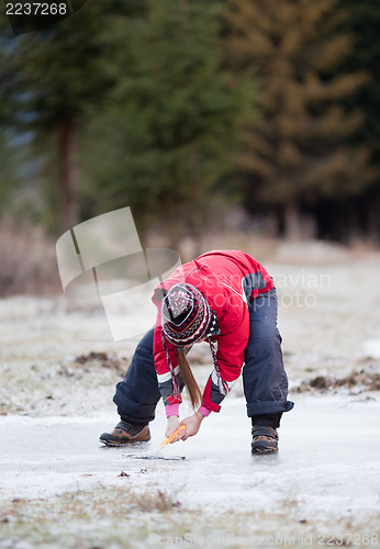 Image of Cleaning  the ice from snow on rink