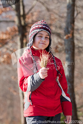 Image of Portrait of little girl outdoors