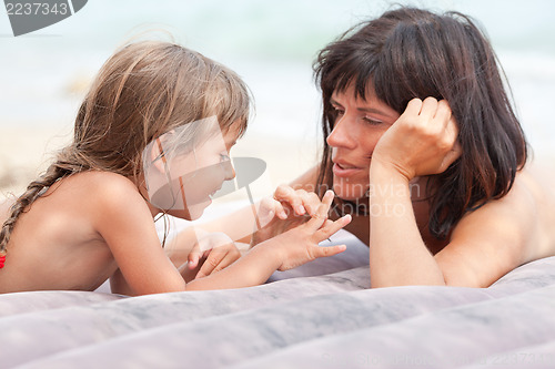 Image of Mother and daughter communicating