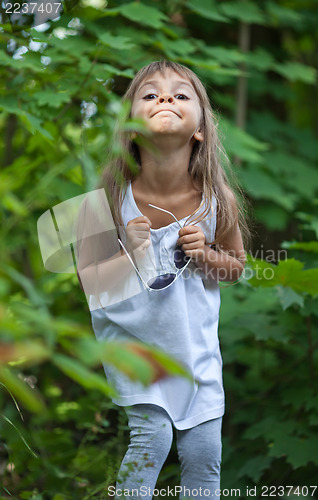 Image of Little girl grimacing