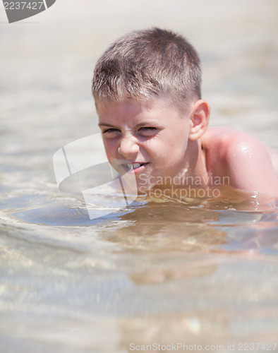 Image of Little boy in the sea