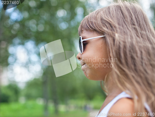 Image of Little girl with sunglasses