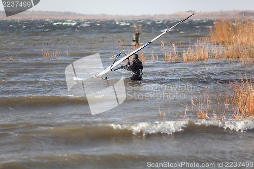 Image of Windsurfer is preparing to start