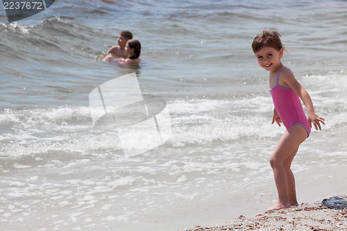 Image of Little girl at sea shore