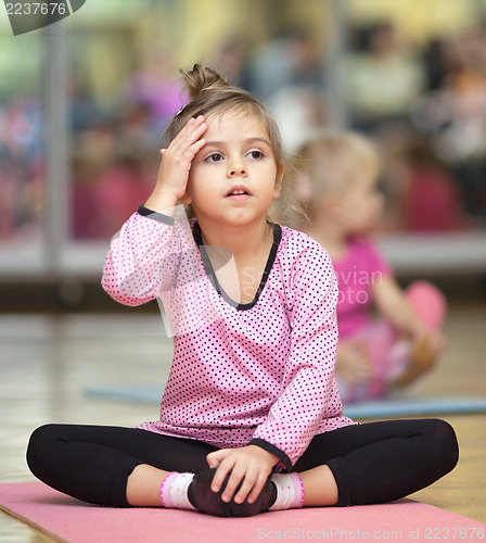 Image of Little girl on mat