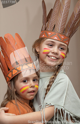 Image of Two little girls in Indian's dresses