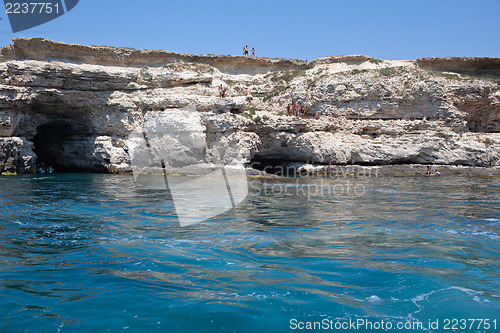 Image of Children on rocky cliffs