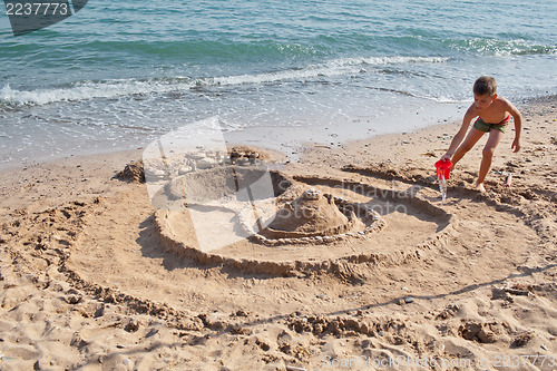 Image of Building sand castle