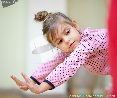 Image of Little girl dancing