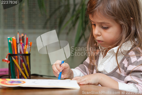Image of Little girl drawing