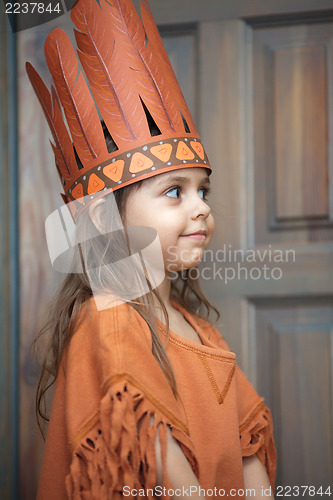 Image of Little girl playing Indian