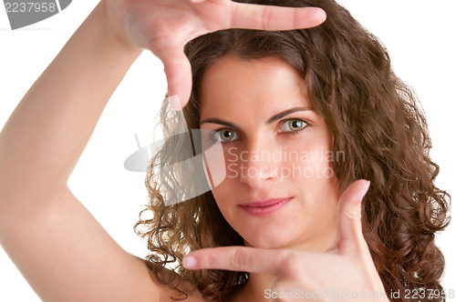 Image of Woman Framing Picture