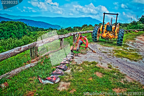 Image of old tractor in the mountains