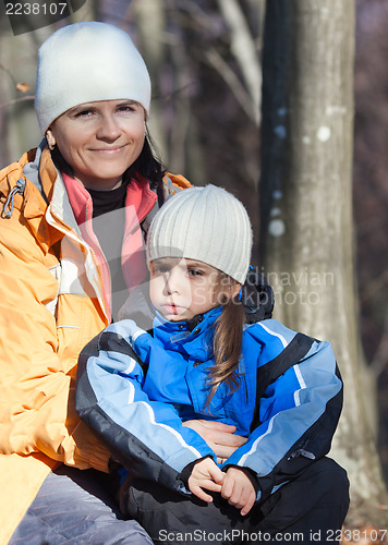 Image of Portrait of mother and daughter outdoors