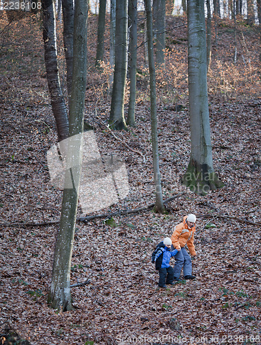 Image of Mother and daughter descending a hill