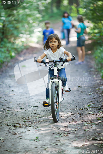 Image of Little girl on a bicycle