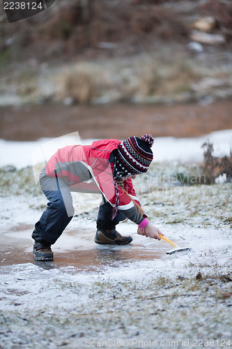 Image of Cleaning  the ice from snow on rink