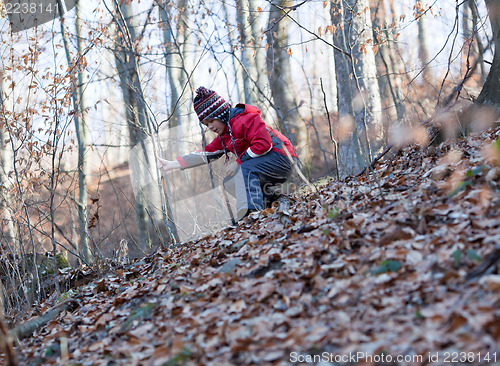 Image of Little girl descending a hill