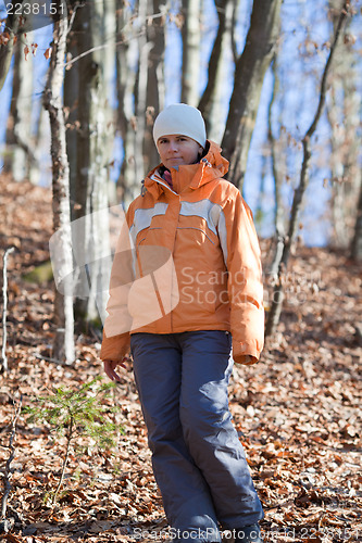 Image of Cute woman in the forest