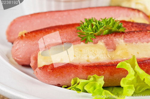 Image of sausages with cheese and omelette