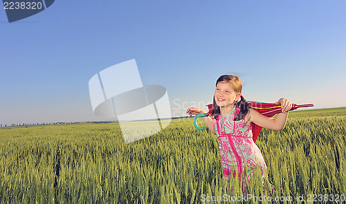 Image of a little girl with a umbrella