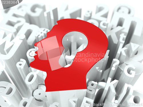 Image of Head with Keyhole on Alphabet Background.