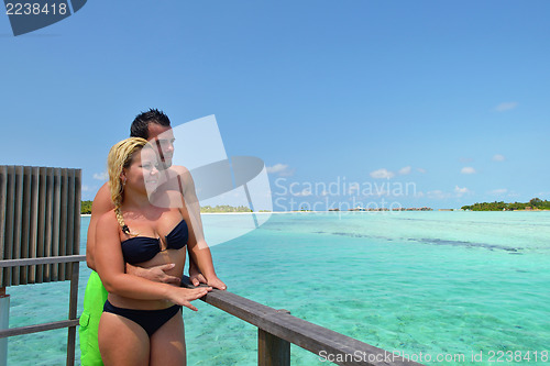 Image of happy young  couple at summer vacation have fun and relax at bea
