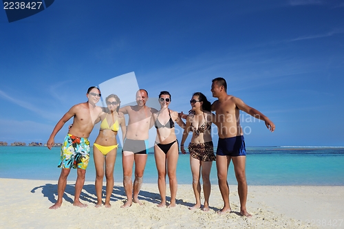 Image of group of happy young people have fun on bach