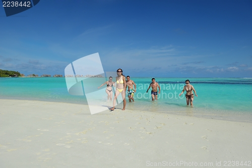 Image of group of happy young people have fun on bach