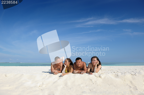 Image of group of happy young people have fun on bach